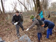 The cleaning of the cemetery.