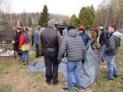 The cleaning of the cemetery.