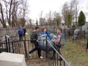 The cleaning of the cemetery.